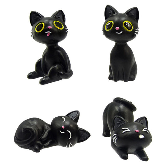 Assortimento di amuleti a forma di gatto nero in confezione regalo
